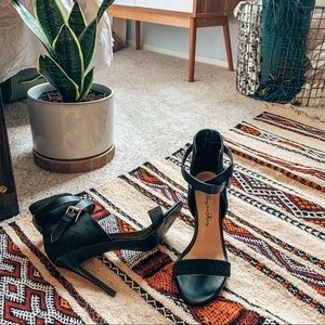 SOLD: Wrap-buckle black stilettos